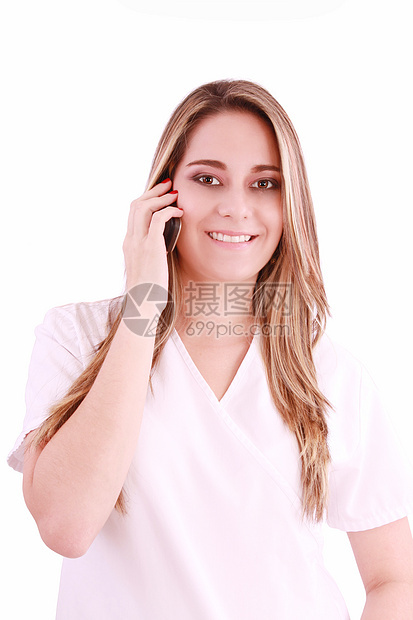 年轻美丽的女护士通过手机交谈 与世隔绝图片