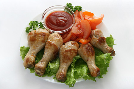 鸡腿加酱汁食物蔬菜家禽盘子香菜午餐油炸图片