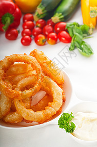 金金深炸洋葱环面包屑戒指育肥食物午餐饮食蔬菜美食盘子小吃图片