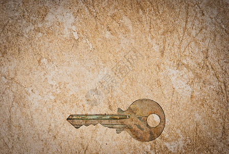 旧纸页背景的锈键工具棕色古董房子金属材料木板财产宏观钥匙图片