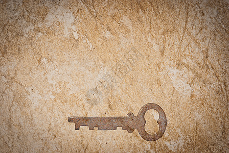 旧纸页背景的锈键木板金属工具古董材料宏观财产棕色房子钥匙图片