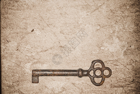 旧纸页背景的锈键宏观金属棕色财产钥匙木板房子材料工具古董图片