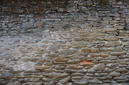 城堡墙墙苔藓石材石头假期岩石砖块旅行工艺水泥历史性背景图片
