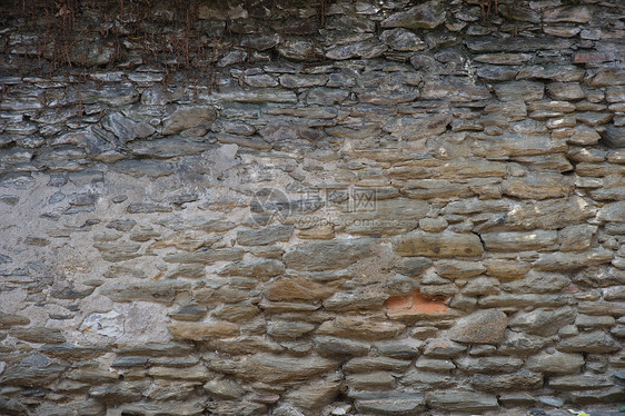 城堡墙墙苔藓石材石头假期岩石砖块旅行工艺水泥历史性图片