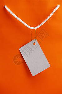 纸袋橙子礼物零售商品纸板对象笔记白色标签购物背景图片
