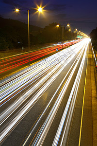 夜间公路踪迹驾驶车辆市中心地标运输蓝色运动交通汽车图片