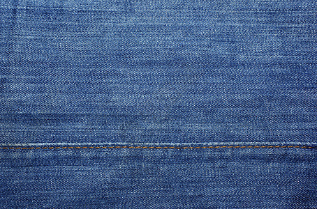 蓝色牛仔裤 黄针作为纺织品抽象背景或黄色图片
