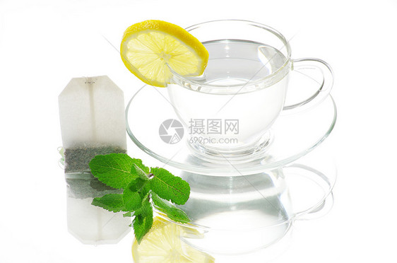 茶杯中的茶绿色香味食物柠檬盘子健康饮食薄荷植物液体水果图片