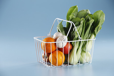 蔬菜橙子纯色绿色食物背景白色金属背景图片