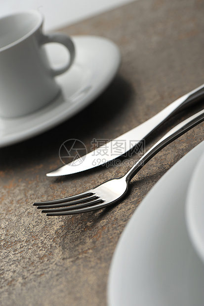 餐桌上的银器贴近了餐刀桌子金属宏观行业酒店家居柔焦餐具图片