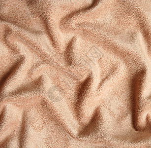 Beige 天鹅绒织物作为背景生产纺织品折痕涟漪装饰投标风格材料衣服曲线图片