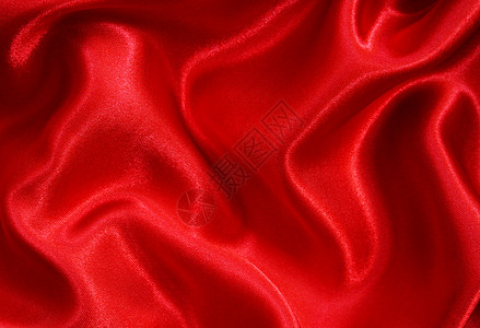 平滑的红丝绸背景投标柔软度布料胭脂红色材料奢华曲线海浪纺织品图片