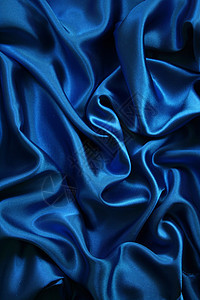 平滑优雅的蓝色丝绸纺织品版税布料曲线织物投标银色海浪感性材料图片