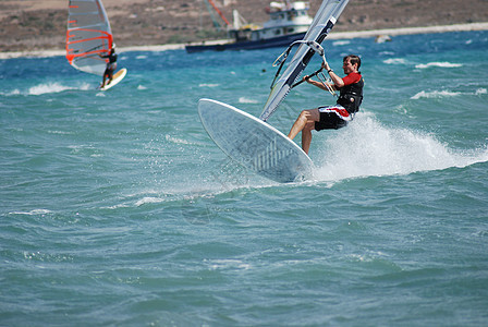 移动时的风向运动男人浪者风帆飞溅木板海浪冲浪火鸡图片