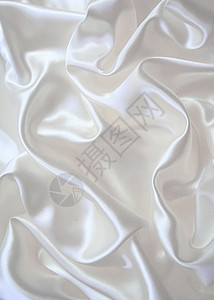 平滑优雅的白色丝绸曲线材料投标织物布料涟漪银色婚礼感性纺织品背景图片