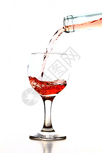 一杯酒酒精液体玻璃瓶子饮料酒杯运动玫瑰流动活力背景图片