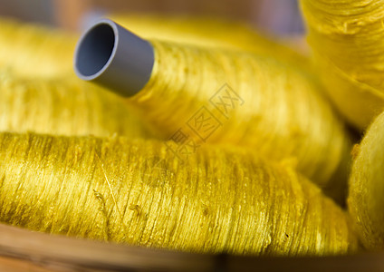 缝线色金色棉布光谱纺织品工艺羊毛丝绸衣服黄色绳索闲暇图片