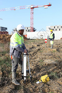 建筑工地工人头盔男人乐器建设职业公司工程测量建设者商业图片