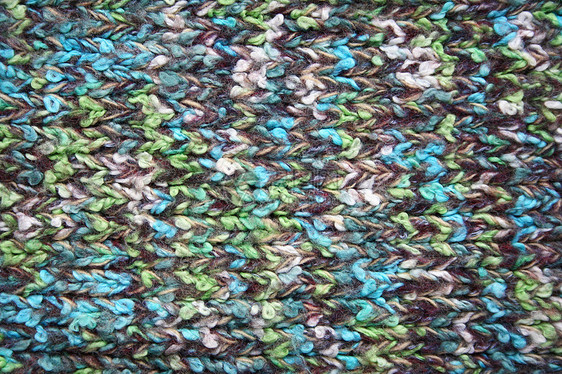 编织羊毛的花彩布料可以用作背景图片