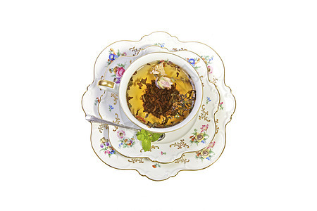 茶杯在HIgh茶杯子薄荷树叶文化制品英语盘子玫瑰草本植物时间图片