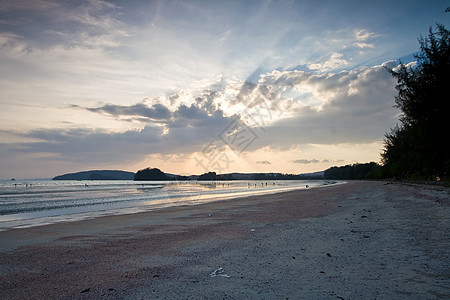 日落海滩季节波纹日光橙子天空假期旅游天气太阳金子图片