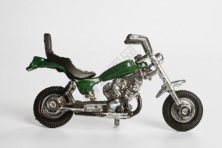 玩具部门摩托车运输白色绿色自行车车轮灰尘图片