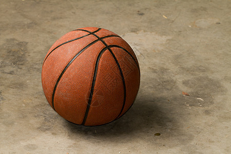 水泥地板上的篮球健身房橙子游戏圆形法庭竞技体育场灰色运动地面图片
