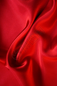 平滑的红丝绸背景曲线奢华织物热情布料红色粉色纺织品柔软度窗帘图片