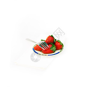 白色的新鲜草莓甜点盘子餐巾浆果叶子营养小吃水果饮食种子图片