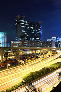 夜间和通交通的公路踪迹驾驶地标场景沥青摩天大楼天际速度蓝色首都图片