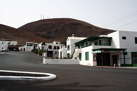 兰萨罗特的房屋全景旅游指南山脉村庄海滩火山潜艇假期背景图片