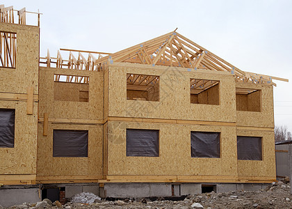兴建新住宅房子木板框架建筑承包商木材蓝色财产材料木头图片