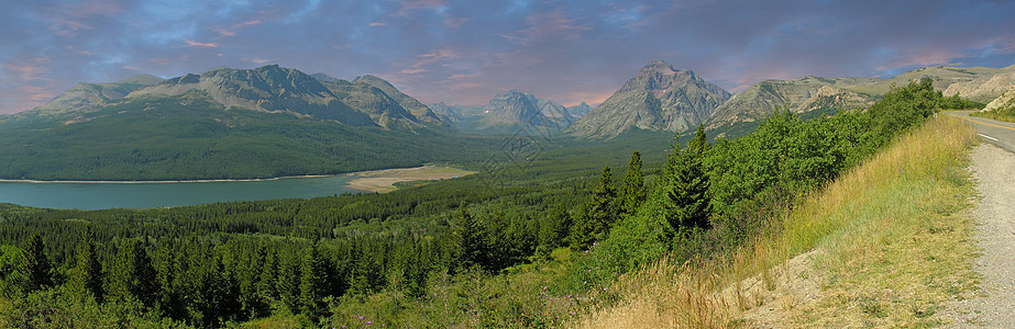 冰川国家公园全景荒野森林山峰天气反射丘陵岩石日落花朵旅行图片