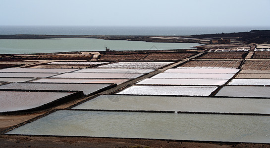 盐在兰萨罗特工作石头岩石火山潜艇海滩山脉海岸旅游海鸥街道图片
