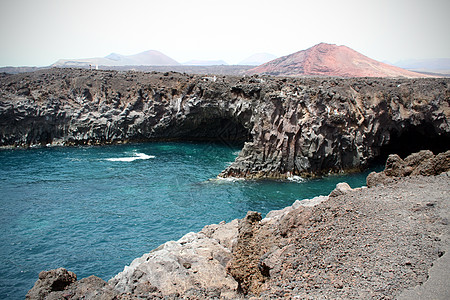 水上岩石 海景景观全景村庄旅游假期海鸥石头海滩火山山脉潜艇图片