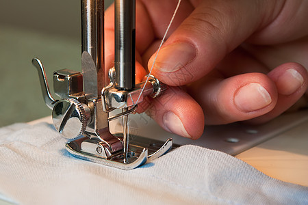 缝纫机机械裁缝工作女裁缝缝纫纺织品维修针脚工厂裙子图片