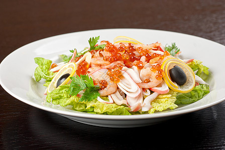 海沙拉餐厅鱼子海鲜沙拉鱿鱼草药盘子美食奢华柠檬图片