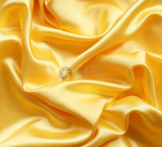 平滑优雅的金金丝绸曲线布料材料丝绸折痕织物黄色涟漪纺织品投标图片