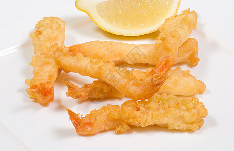 Temurura虾柠檬油炸服务面包屑海鲜水平美食大虾起动机图片
