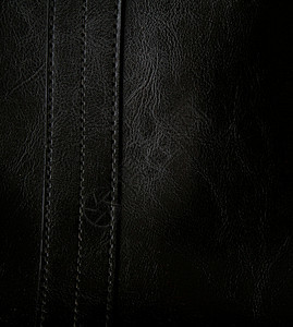 黑皮革纹理作为背景的特写皮肤折痕宏观革质黑色墙纸皮革棕色织物颗粒状图片