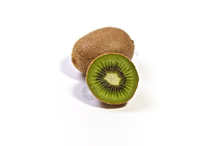 Kiwi 水果食物醋栗饮食果皮白色营养棕色播种反射皮肤图片