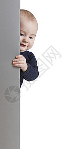 持有垂直标志的幼儿白色蓝色手表陈列柜婴儿微笑儿童灰色手指单身图片