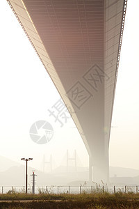 日落时桥桥 山桥速度城市旅行海洋景观地标射线天空车辆蓝色图片
