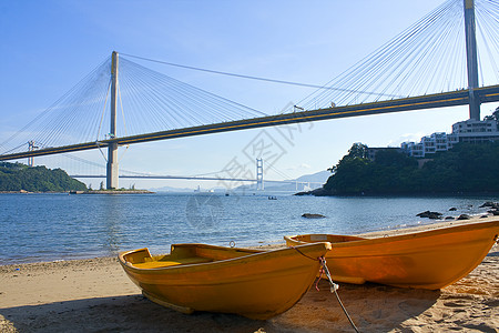 舰桥下海滩上的船码头沿岸假期海滩海岸蓝色绳索皮带天空晴天图片
