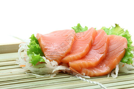 sashimi沙拉烹饪寿司美食海洋蔬菜食物鱼片白萝卜盘子橙子图片