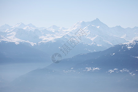 山上有高山活动冻结风景岩石单板远足滑雪蓝色旅行冰川图片