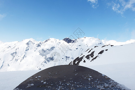 山上雪花滑雪顶峰山脉风景暴风雪季节旅游蓝色爬坡全景图片