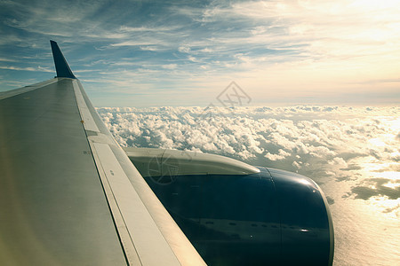 飞机飞行假期晴天航班蓝色活力游客乘客喷射窗户航空公司图片