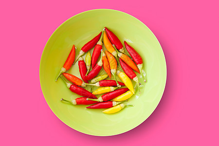 孤立的彩色辣椒辣椒板水果蔬菜盘子调味品胡椒辣味美食味道食物橙子图片