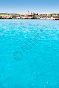 圣安东尼奥海滩上的假期石头胰岛小岛晴天波浪天堂太阳蓝色岩石图片